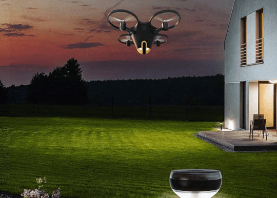 Security drone patrolling a house